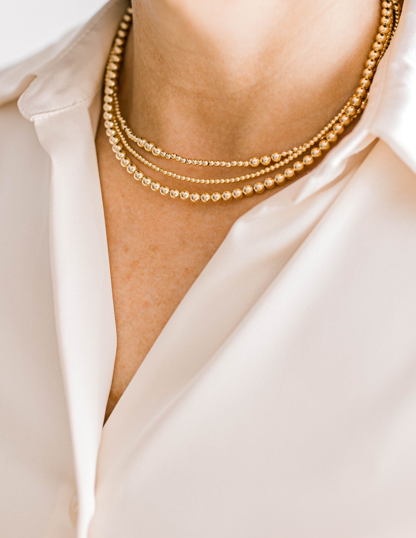 Beautiful, dainty, and perfect for stacking! These necklaces can easily take you from your work out to a night out! Hand strung with love on and all materials proudly made in the USA.
14k gold filled beads or .925 sterling silver
3mm, 4mm, and 5mm
Available in 15 inch or 17 inch.
*extended sizing available upon request*