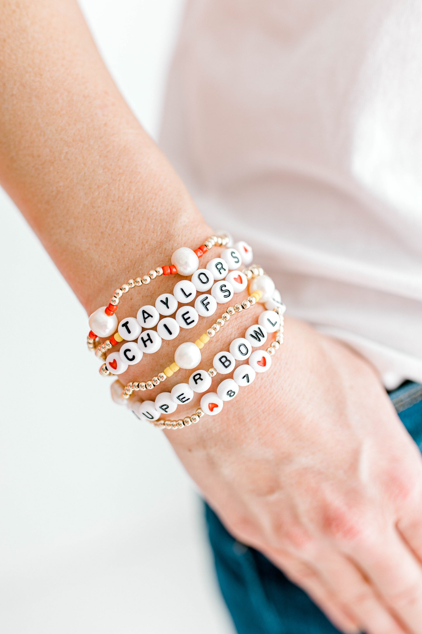 Subtle, dainty, and perfect for all Kansas City Chiefs fans! Our signature Pearly Pop bracelet design, but make it Chiefs!! These bracelets include 3mm 14k gold filled beads, freshwater pearls, and red or yellow seed beads.