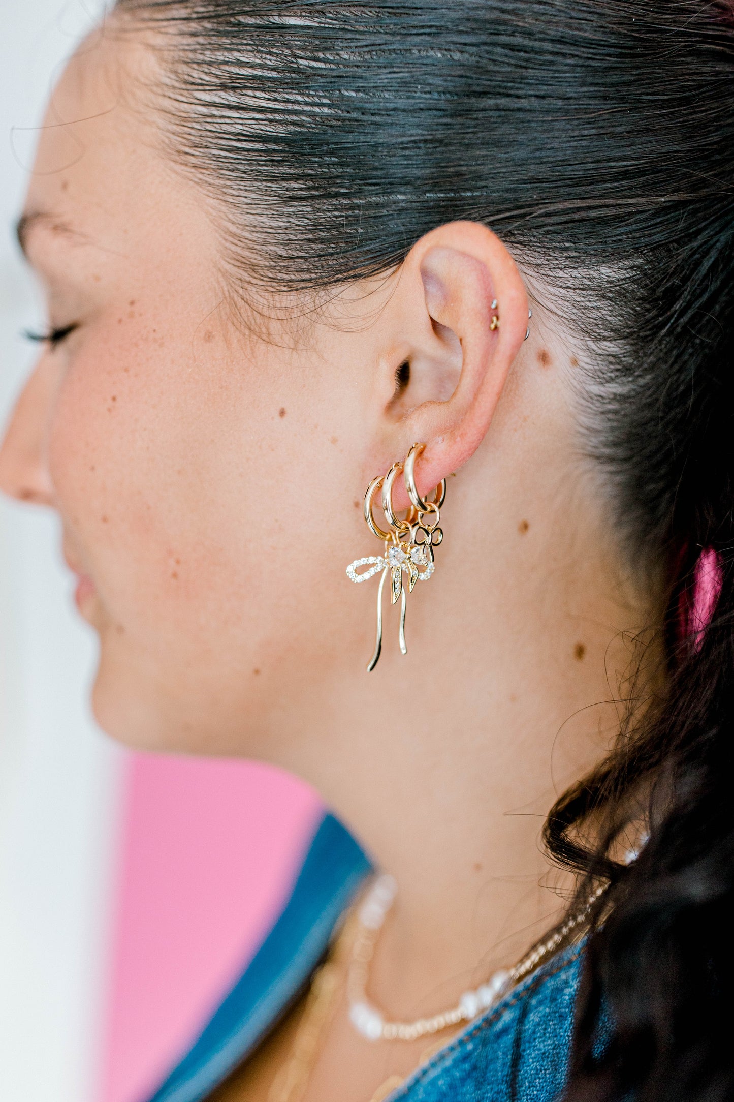 A 14k gold filled click hinge hoops made perfectly for your custom made Pearly Pie charm earrings. You will get a set of two hoops in the size you choose. Add charms using our online earring charm bar.
The largest size can hold 1-3 depending on size of charms and our smaller sizes are best for 1 charm. If you want the same charm on each hoop, be sure to add two to your cart.