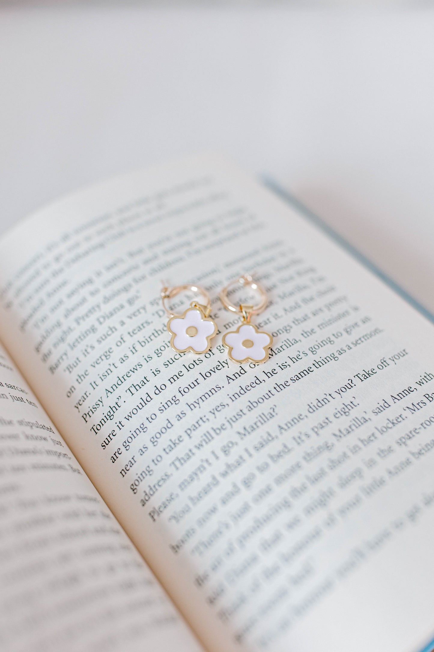 A 14k gold filled click hinge hoops made perfectly for your custom made Pearly Pie charm earrings. You will get a set of two hoops in the size you choose. Add charms using our online earring charm bar.
The largest size can hold 1-3 depending on size of charms and our smaller sizes are best for 1 charm. If you want the same charm on each hoop, be sure to add two to your cart.