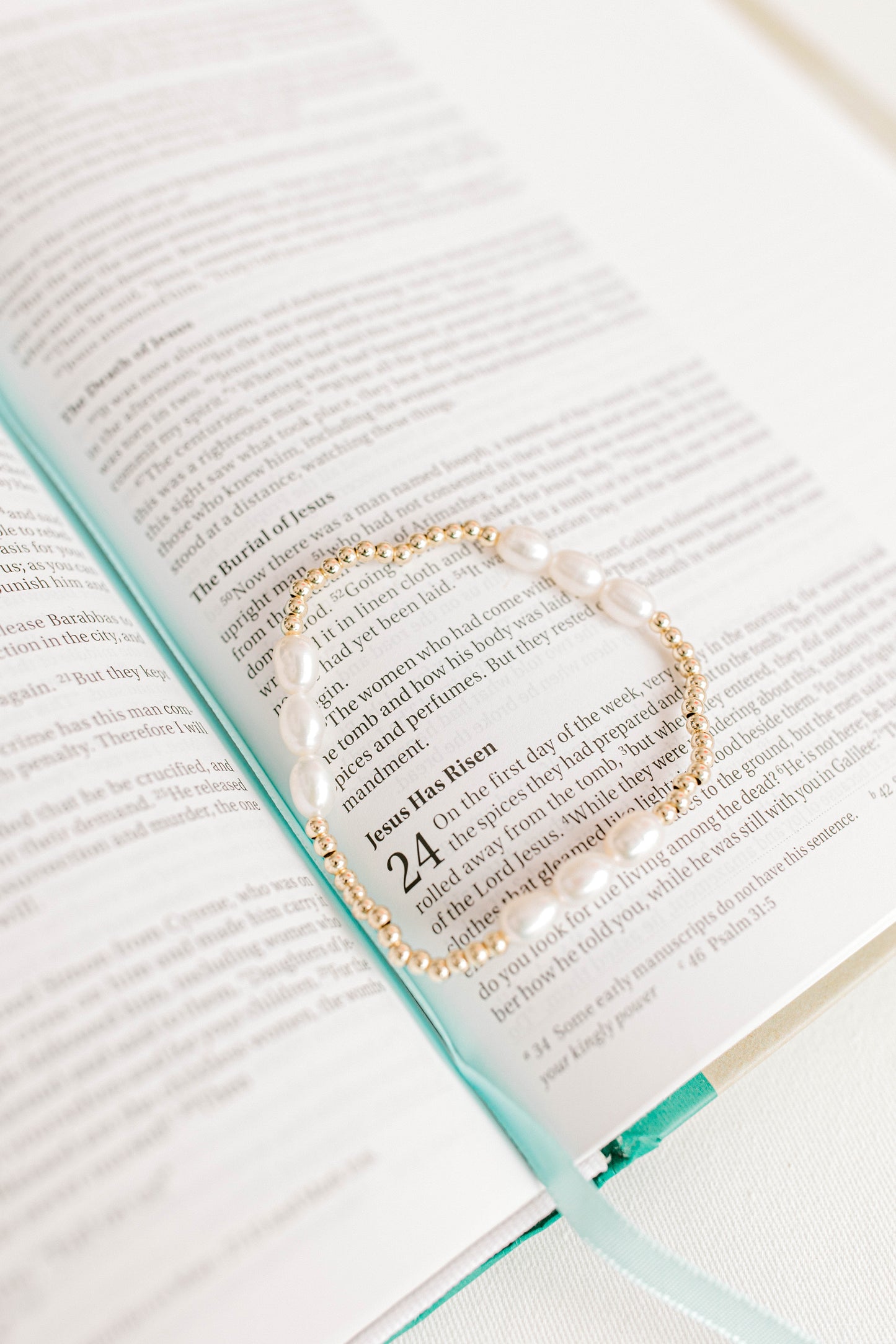 Luke 24:6-7 6 "He is not here, but has risen. Remember how he told you while he was still in Galilee, 7 that the Son of Man must be delivered into the hands of sinful men and be crucified and on the third day rise."
This bracelet has a rotating pattern of three pearls to represent Jesus rising from the dead on the third day followed by 3mm gold beads