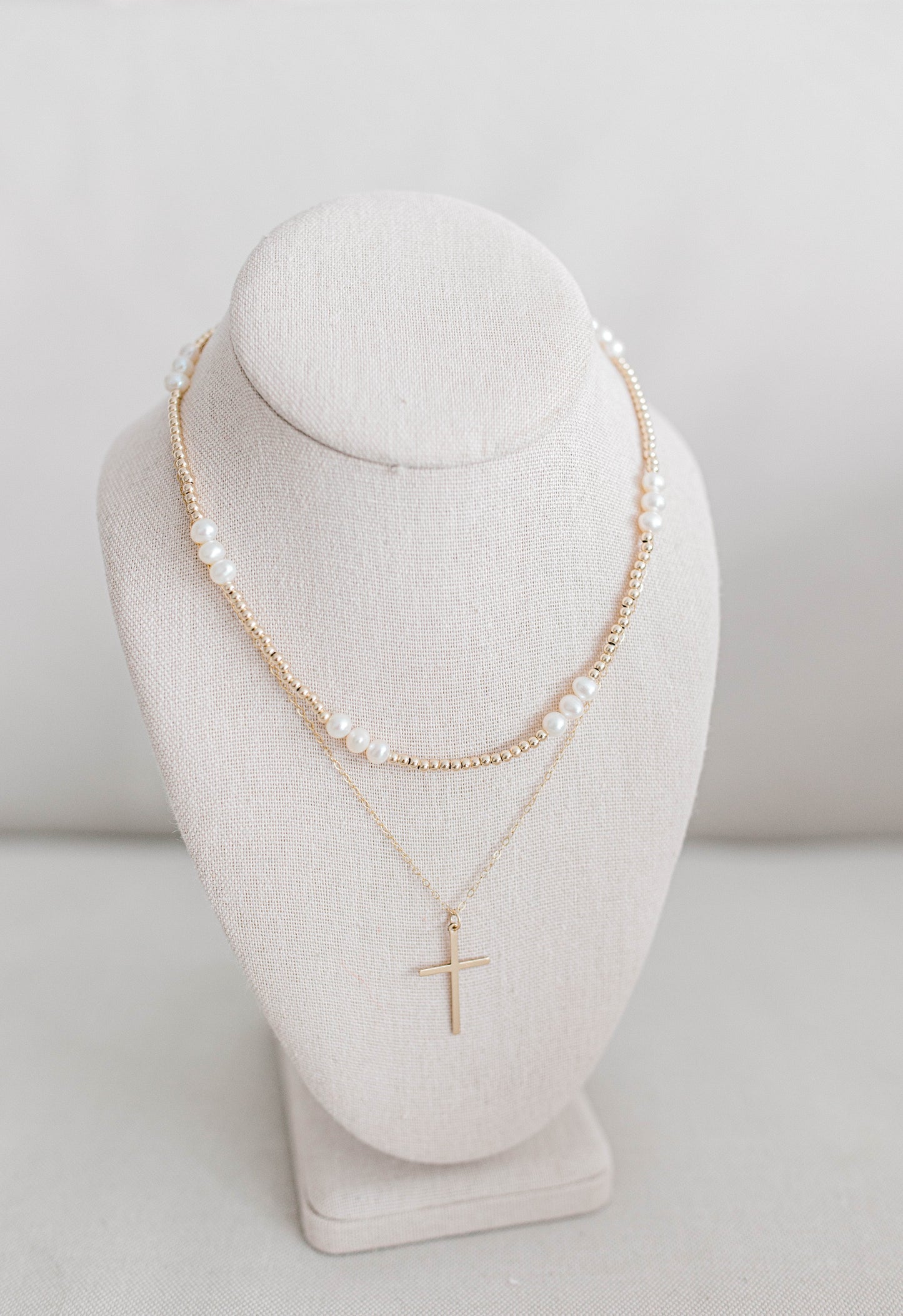 The Large Gold Cross is a 17x28mm gold filled cross on 1.5mm dainty gold filled oval chain with gold filled clasp and findings. 18" in total length. If an extender is desired please add to notes.
For the John 3:16 necklace we have a pattern of three larger beads followed by sixteen smaller beads. All 14K gold filled beads, fresh water pearl, or .925 sterling silver beads, all materials proudly made in the USA. Available in 15 inch or 17 inch.
*extended sizing available upon request*