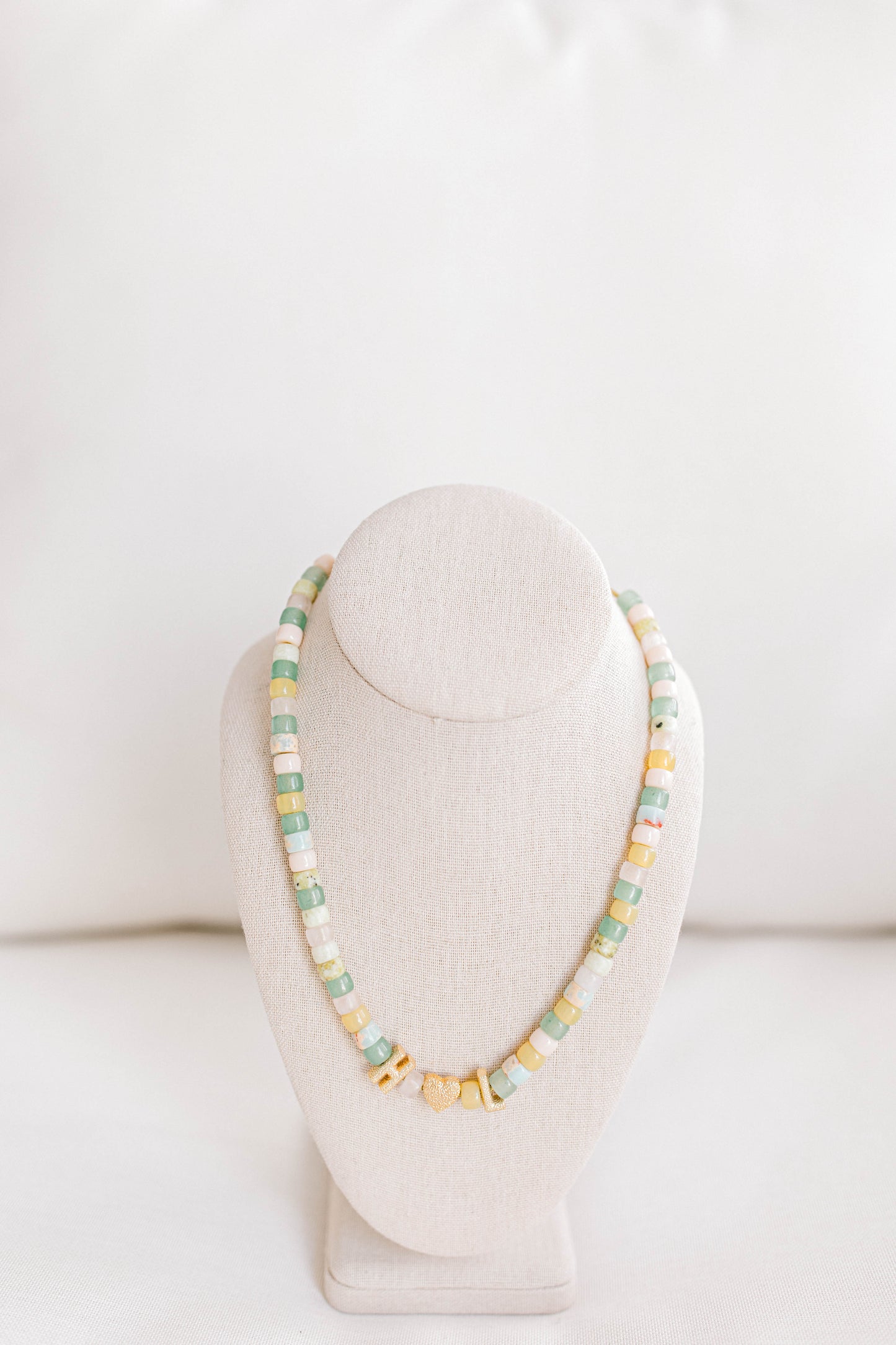 This beautiful necklace is made with forte gemstones and 18k gold filled stardust spacer beads that are strung on lurex cord with an adjustable sliding knot. This necklace can be personalized with 18k gold filled stardust letters and/or heart beads. If you want to add letter beads, please put what letter beads you would like with your necklace in the personalization box. Any custom features no listed in the bead options, please also put in the personalization box.