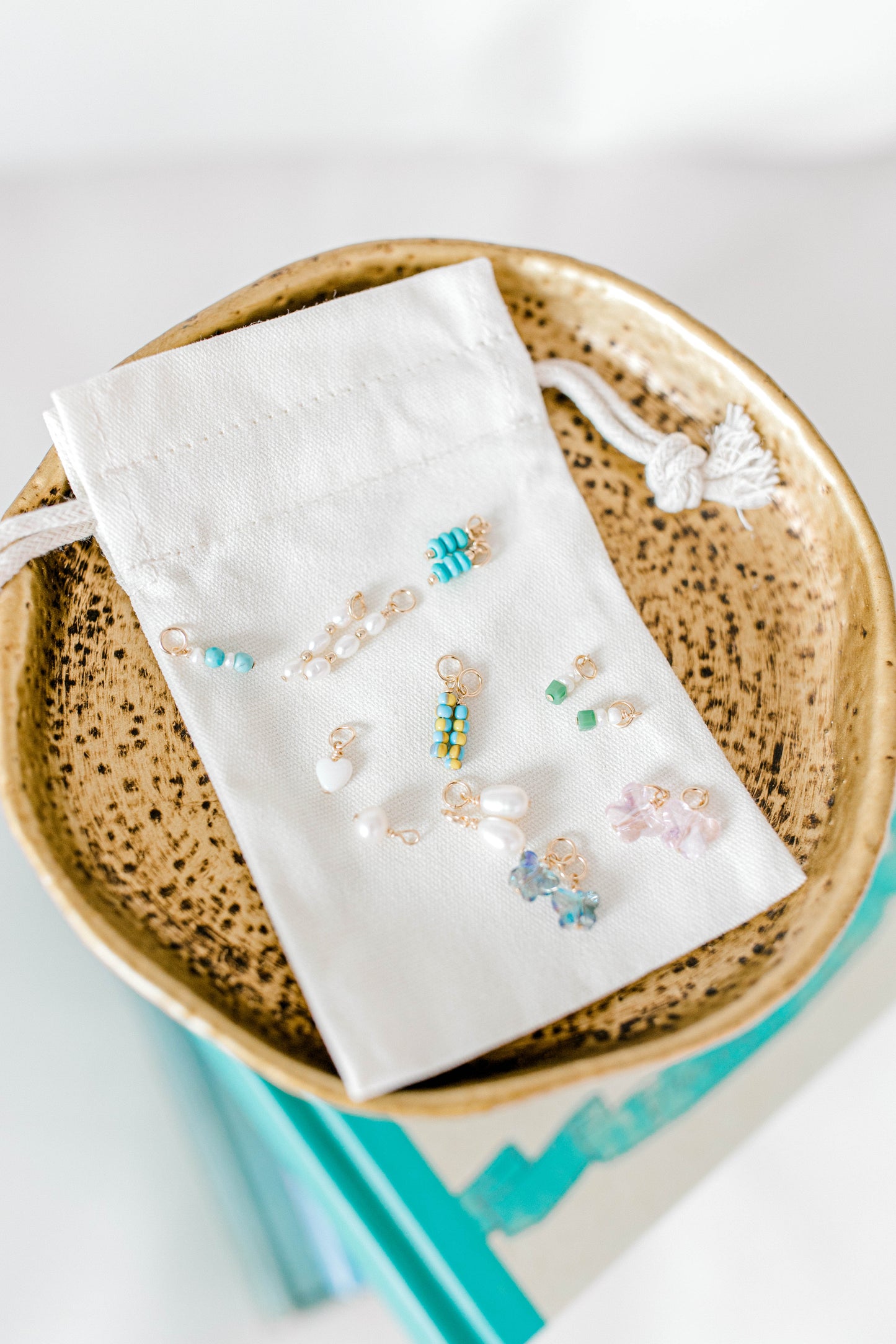 Handmade teardrop pearl charm made perfectly for your custom made Pearly Pie charm jewelry. This classic teardrop pearl charm is more narrow at the top and gets fuller at the bottom.