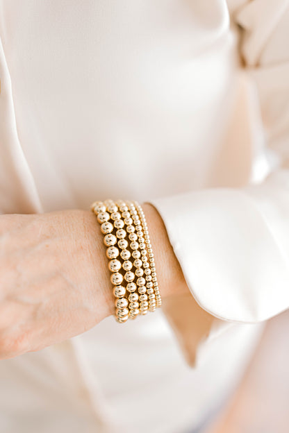 Beautiful, dainty, and perfect for stacking! These bracelets can easily take you from your work out to a night out! Hand strung with love on durable, stretchy elastic with all materials proudly made in the USA.
* 14k gold filled beads or .925 sterling silver
* 3mm, 4mm, 5mm, 6mm, and 7mm options