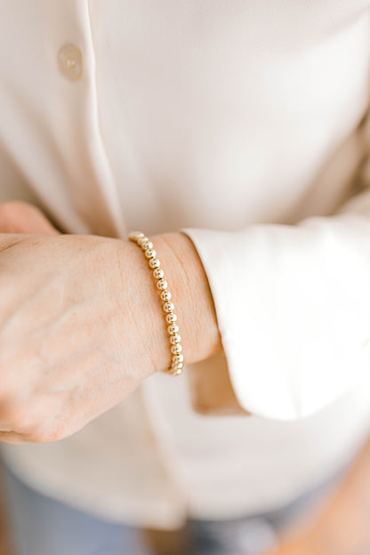 Beautiful, dainty, and perfect for stacking! These bracelets can easily take you from your work out to a night out! Hand strung with love on durable, stretchy elastic with all materials proudly made in the USA.
* 14k gold filled beads or .925 sterling silver
* 3mm, 4mm, 5mm, 6mm, and 7mm options