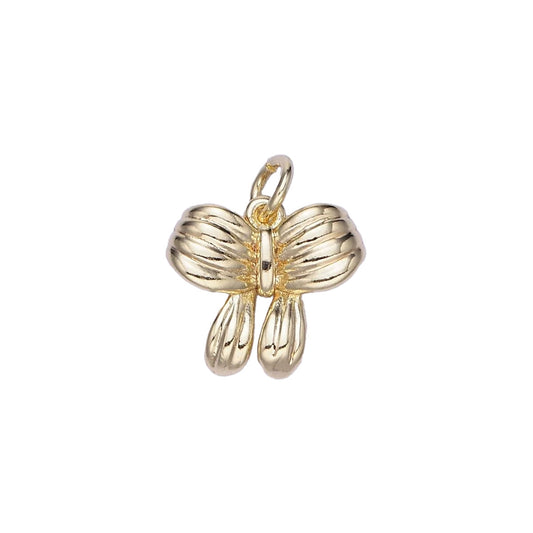 A 14k gold filled mini bow charm made perfectly for your custom made Pearly Pie charm necklace.