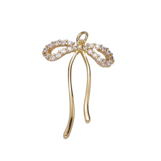 A 14k gold filled bow charm with diamond accents, made perfectly for your custom made Pearly Pie charm necklace.