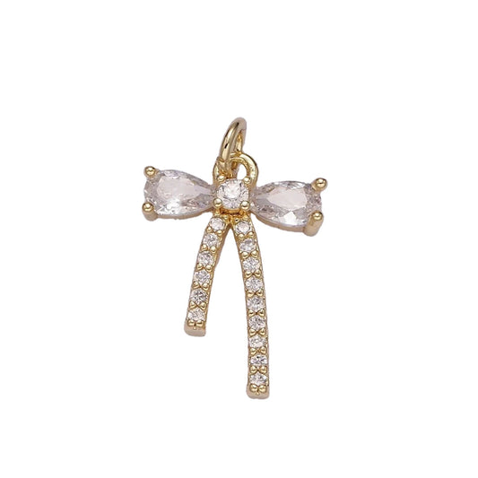 A 14k gold filled bow with diamonds charm made perfectly for your custom made Pearly Pie charm necklace.