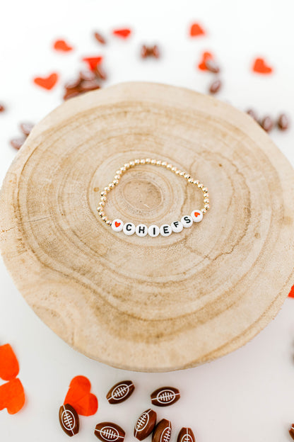 We're based in STL... of course we're Kansas City Chiefs fans! These sporty and cute bracelets include 3mm 14k gold filled beads and white/black letter beads.
