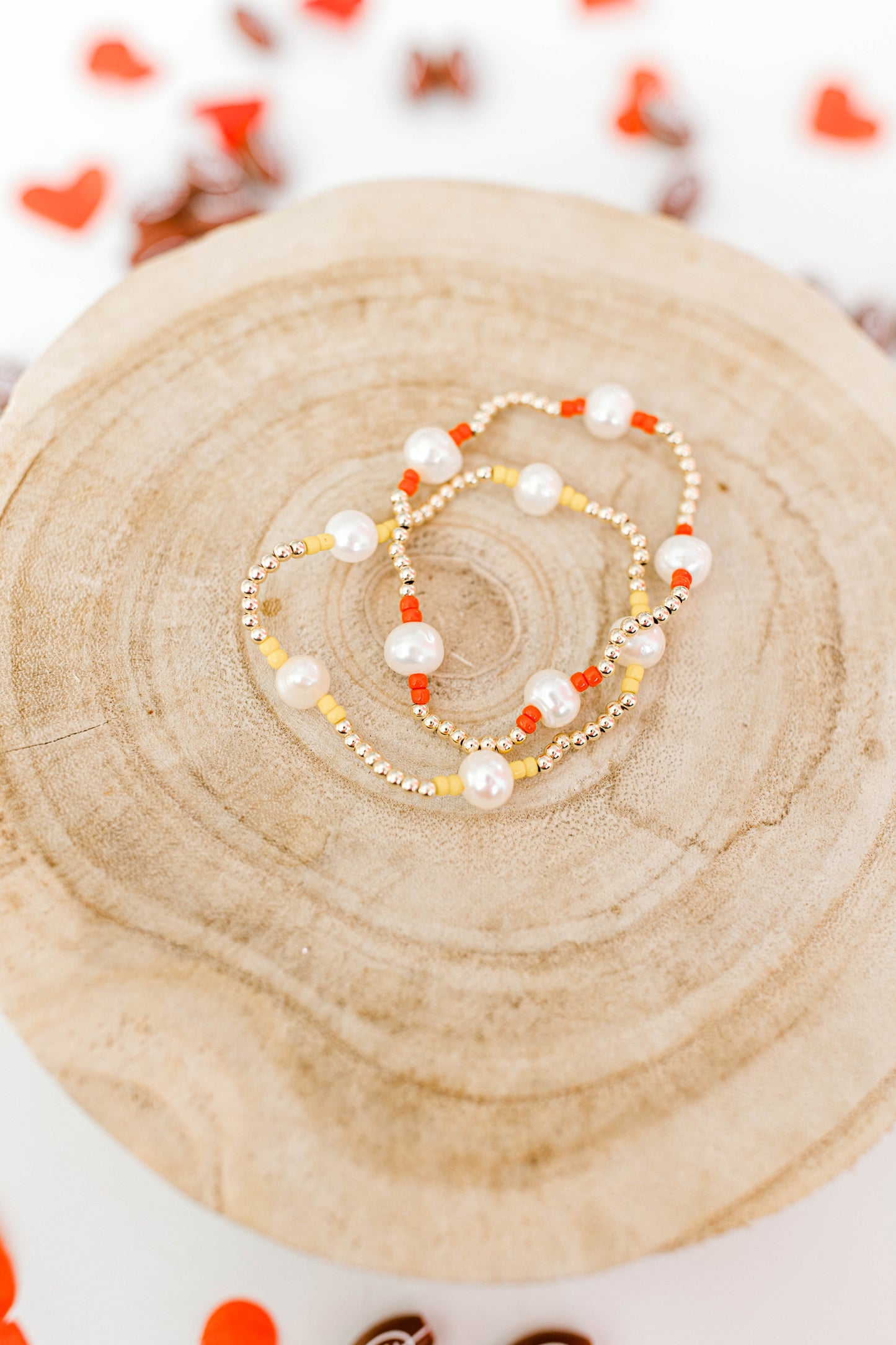 Subtle, dainty, and perfect for all Kansas City Chiefs fans! Our signature Pearly Pop bracelet design, but make it Chiefs!! These bracelets include 3mm 14k gold filled beads, freshwater pearls, and red or yellow seed beads.