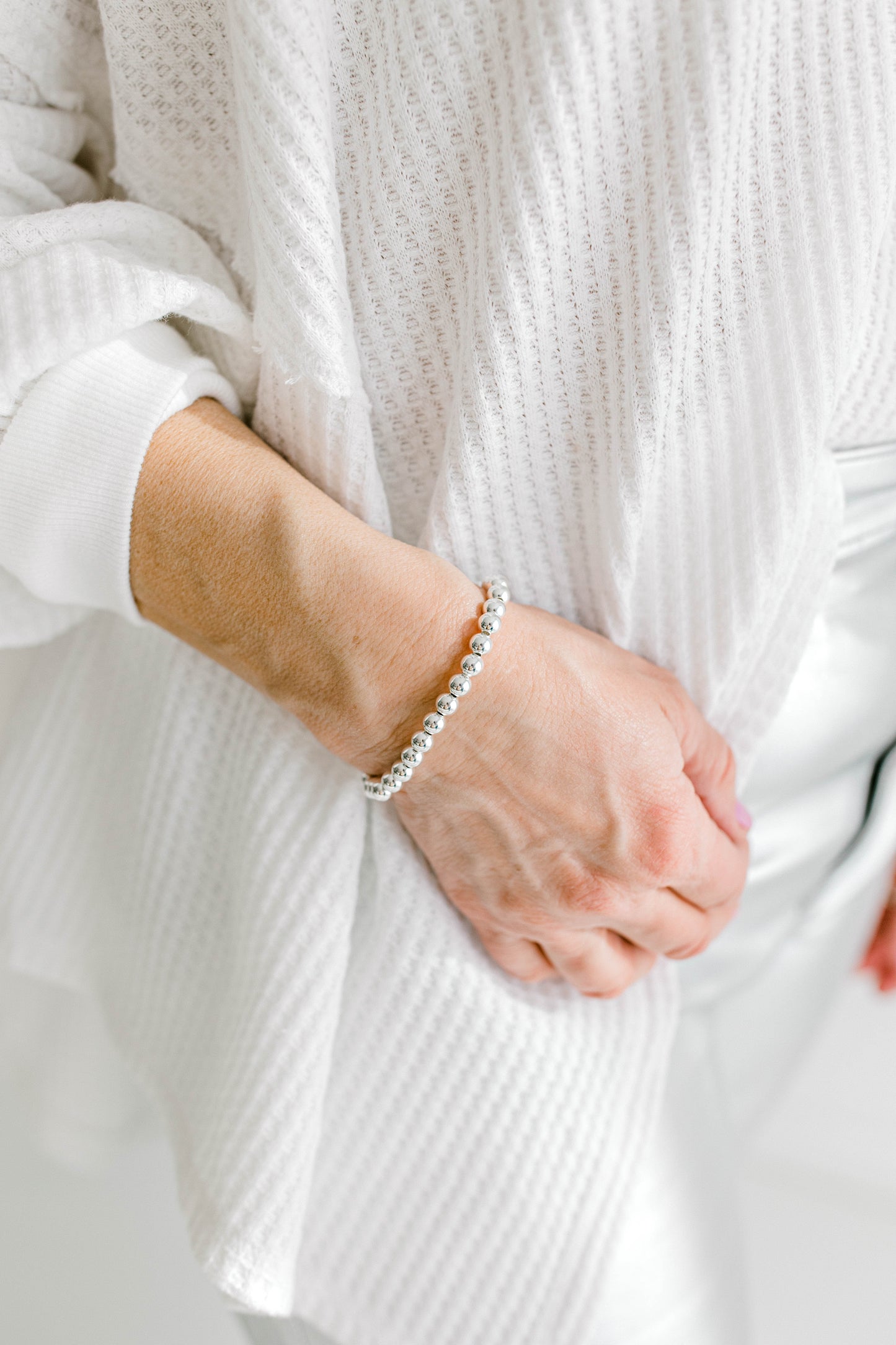 Beautiful, dainty, and perfect for stacking! These bracelets can easily take you from your work out to a night out! Hand strung with love on durable, stretchy elastic with all materials proudly made in the USA.

14k gold filled beads or .925 sterling silver
3mm, 4mm, 5mm, 6mm, and 7mm options