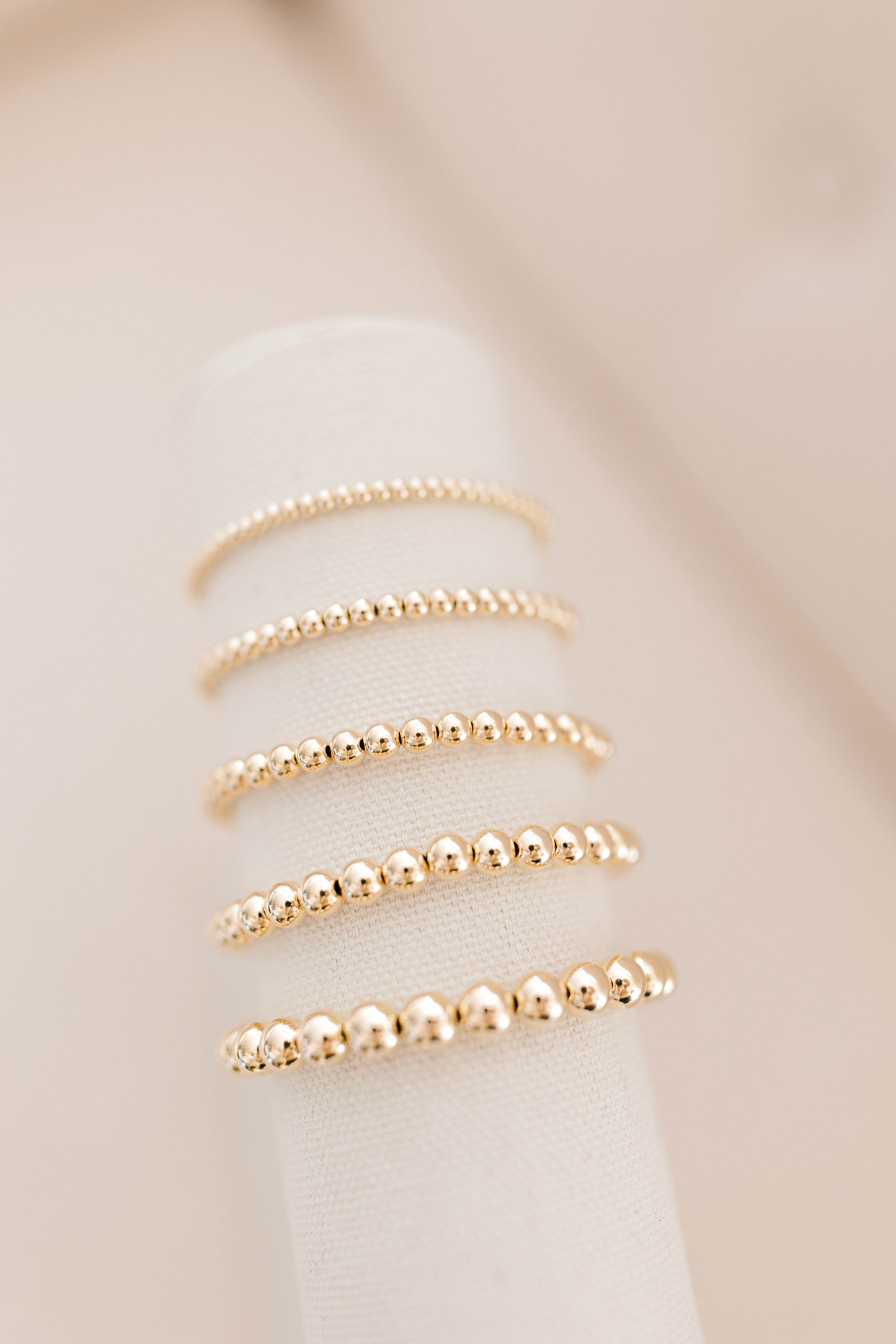 Beautiful, dainty, and perfect for stacking! These bracelets can easily take you from your work out to a night out! Hand strung with love on durable, stretchy elastic with all materials proudly made in the USA.
* 14k gold filled beads or .925 sterling silver
* 3mm, 4mm, 5mm, 6mm, and 7mm options