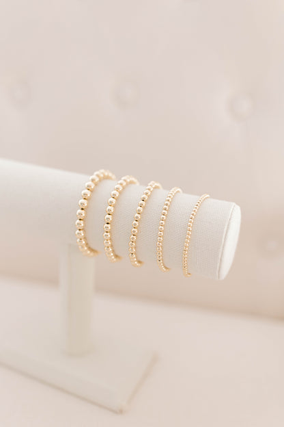 Beautiful, dainty, and perfect for stacking! These bracelets can easily take you from your work out to a night out! Hand strung with love on durable, stretchy elastic with all materials proudly made in the USA.
* 14k gold filled beads or .925 sterling silver
* 3mm, 4mm, 5mm, 6mm, and 7mm options