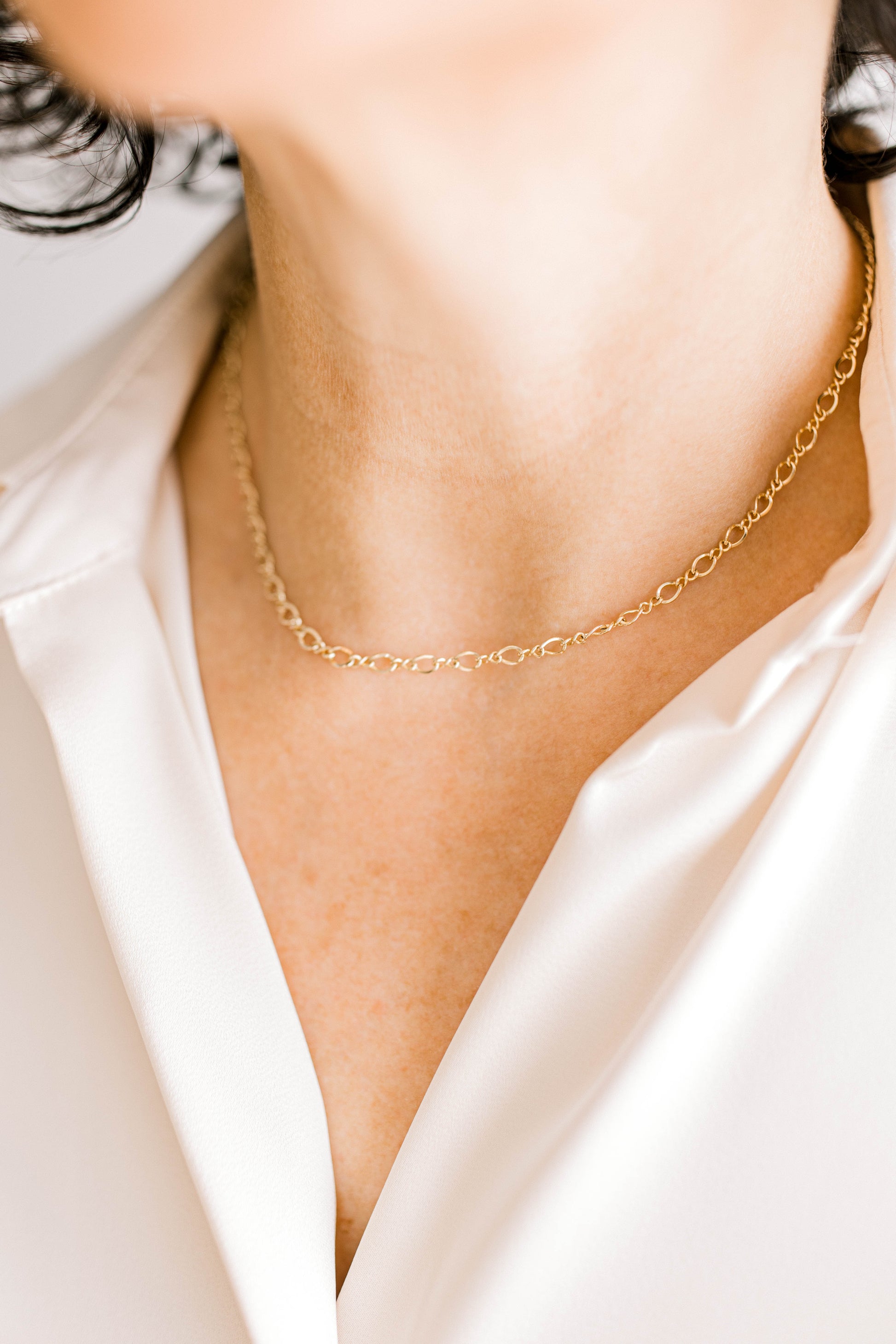 A sweet, subtle, and unique chain in a figure eight style that is perfect for any occasion! This necklace is a 14K dainty gold chain and a 14K gold filled lobster clasp. This necklace is 15 inches with an optional 1, 2, or 3 inch extender.