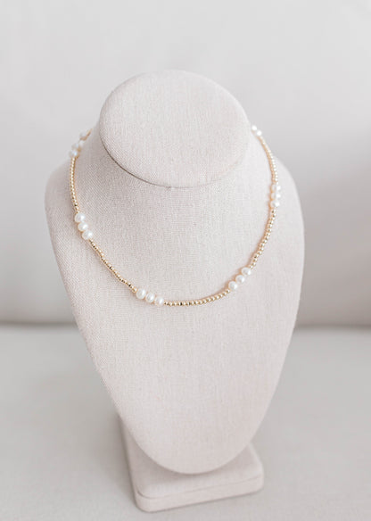 For this necklace we have a pattern of three larger beads followed by sixteen smaller beads. All 14K gold filled beads, fresh water pearl, or .925 sterling silver beads, all materials proudly made in the USA. Available in 15 inch or 17 inch.

*extended sizing available upon request*