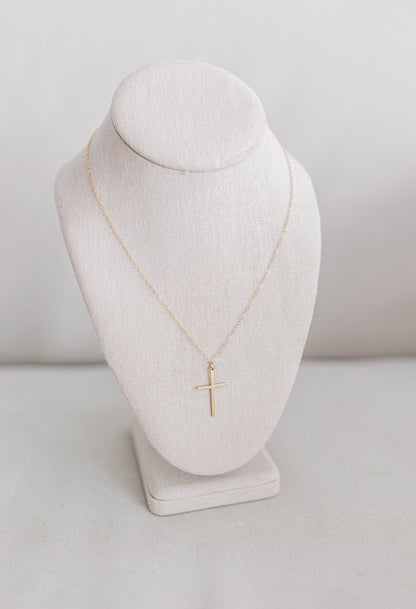 17x28mm gold filled cross on 1.5mm dainty gold filled oval chain with gold filled clasp and findings. 18" in total length.  If an extender is desired please add to notes.