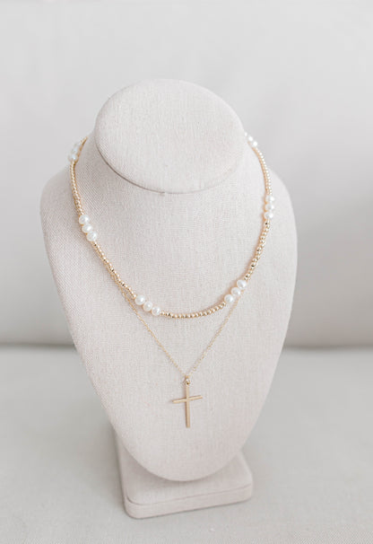 The Large Gold Cross is a 17x28mm gold filled cross on 1.5mm dainty gold filled oval chain with gold filled clasp and findings. 18" in total length.  If an extender is desired please add to notes.

For the John 3:16 necklace we have a pattern of three larger beads followed by sixteen smaller beads. All 14K gold filled beads, fresh water pearl, or .925 sterling silver beads, all materials proudly made in the USA. Available in 15 inch or 17 inch.

*extended sizing available upon request*