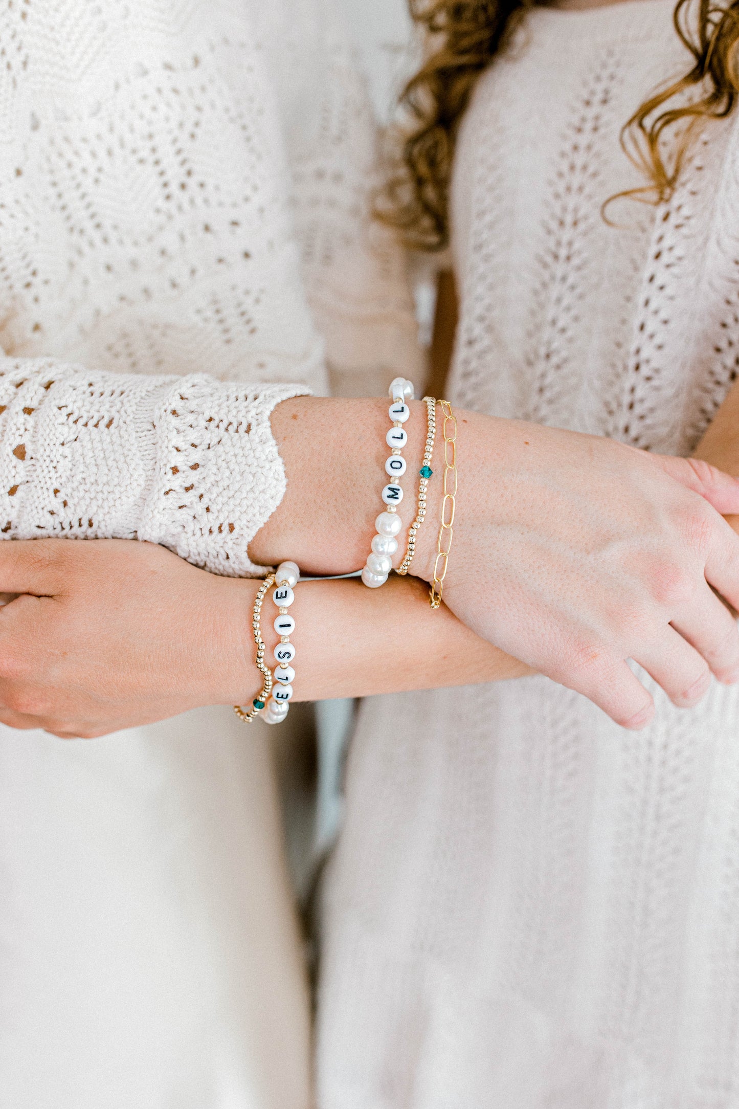 The perfect bracelet for all the mamas out there! This freshwater pearl bracelet can be made with gold letter beads or white letter beads.