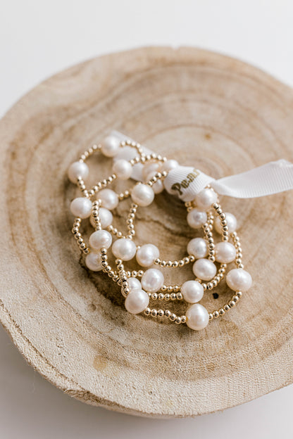 Simple, dainty, and beautiful! The perfect combination for everyday wear or a special occasion. Hand made and strung with love, perfect for you or gifting to someone you love! 3mm 14K gold filled beads with fresh water pearls.