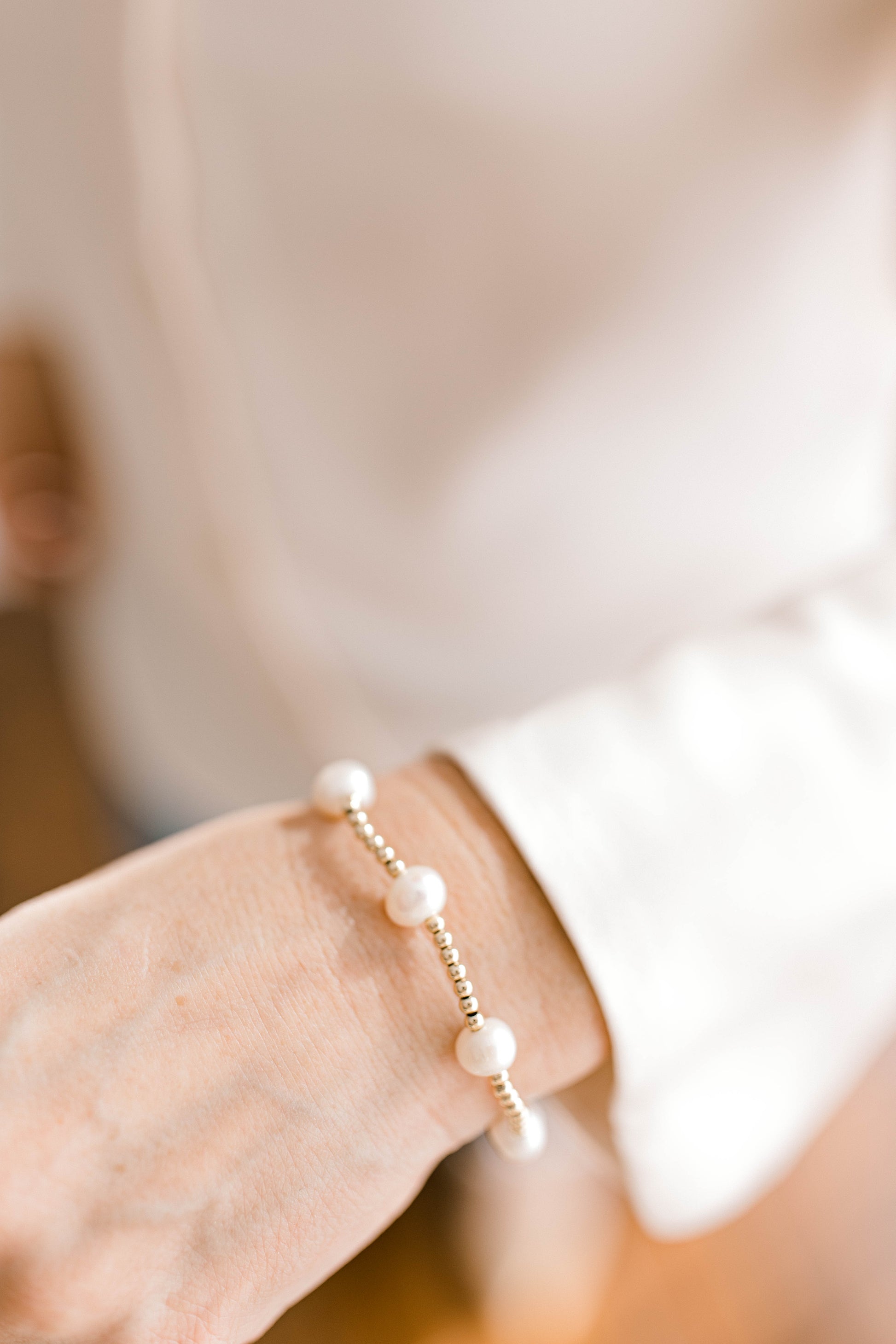 Simple, dainty, and beautiful! The perfect combination for everyday wear or a special occasion. Hand made and strung with love, perfect for you or gifting to someone you love! 3mm 14K gold filled beads with fresh water pearls.
