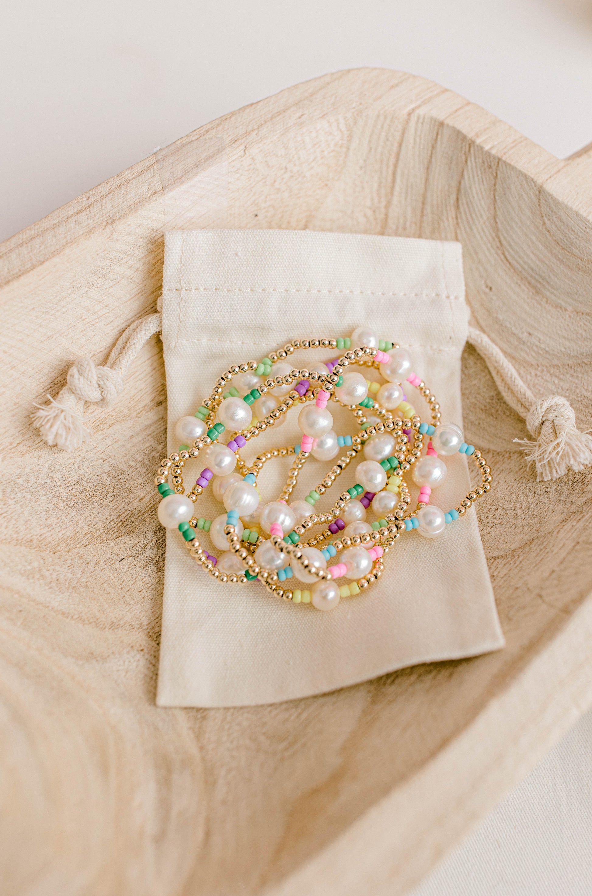 Our signature Pearly Pop bracelet design has our heart! They're fun, simple, and perfect for any occasion! These bracelets include 3mm 14k gold filled beads, freshwater pearls, and colored seed beads of your choosing.