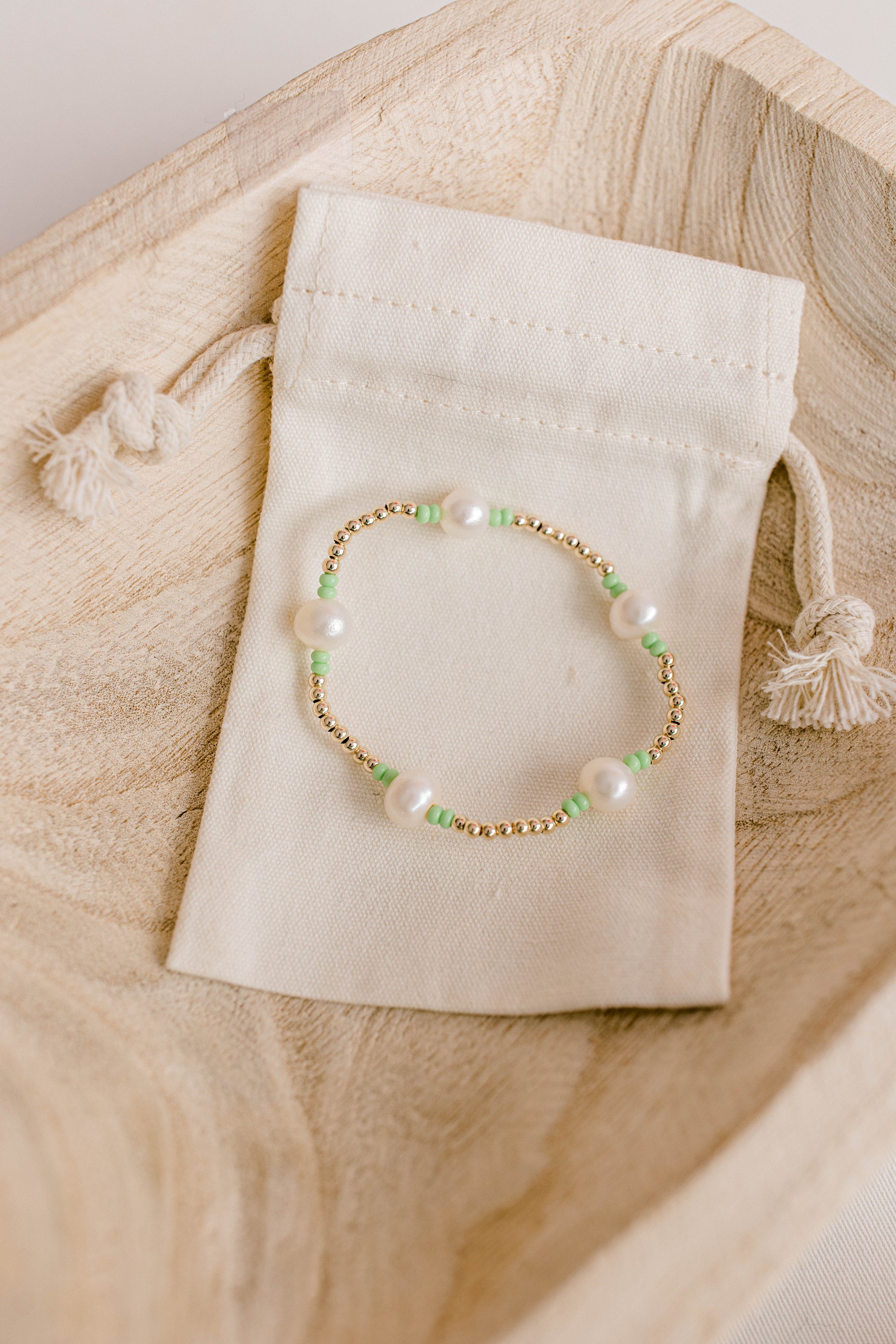 Our signature Pearly Pop bracelet design has our heart! They're fun, simple, and perfect for any occasion! These bracelets include 3mm 14k gold filled beads, freshwater pearls, and colored seed beads of your choosing.