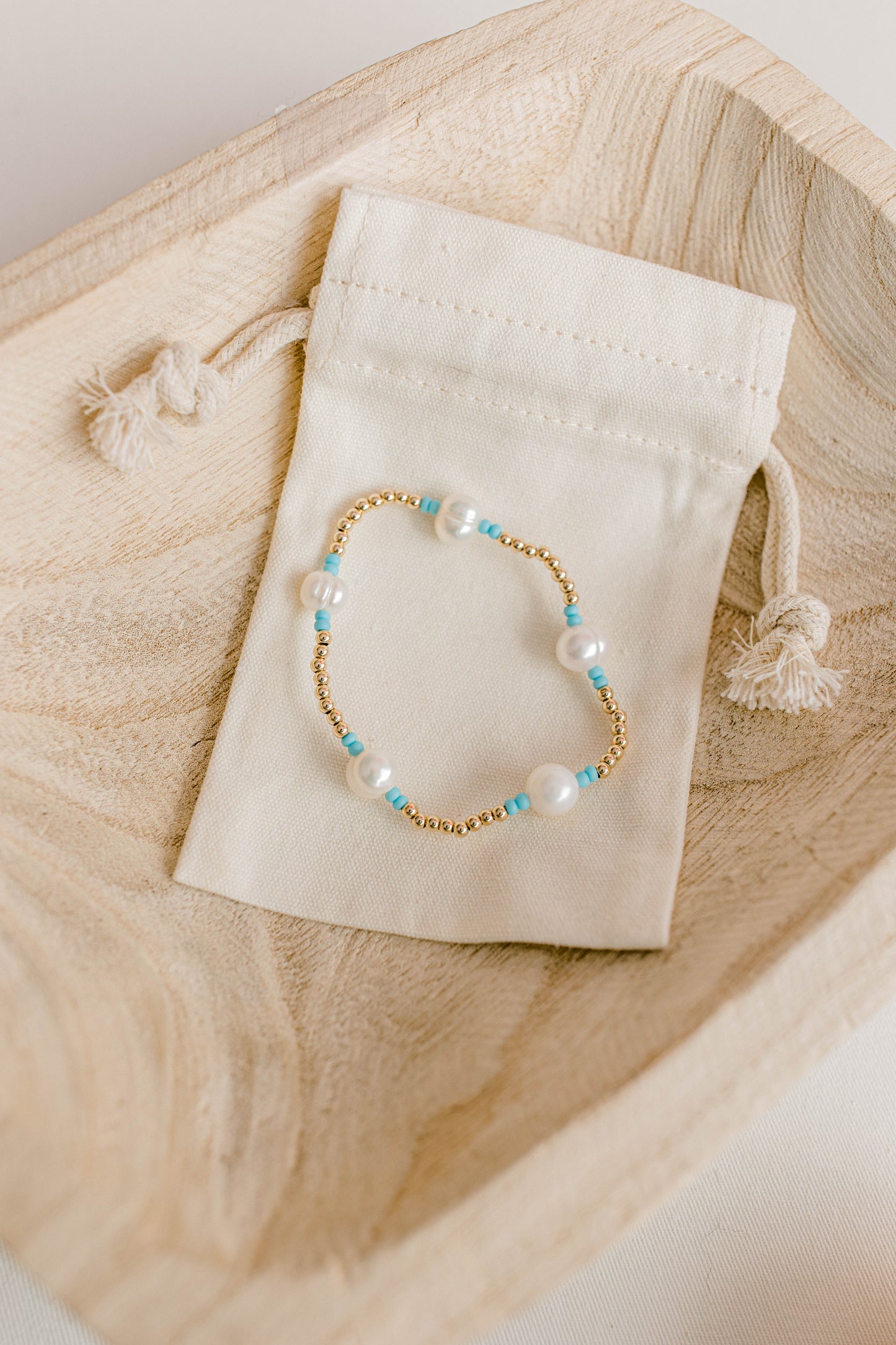 Our signature Pearly Pop bracelet design has our heart! They're fun, simple, and perfect for any occasion! These bracelets include 3mm 14k gold filled beads, freshwater pearls, and colored seed beads of your choosing.