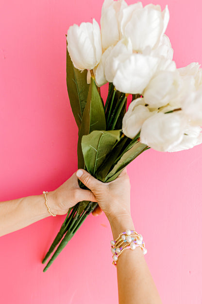 Our signature Pearly Pop bracelet design has our heart! They're fun, simple, and perfect for any occasion! These bracelets include 3mm 14k gold filled beads, freshwater pearls, and colored seed beads of your choosing.