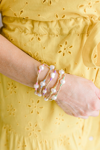 Our signature Pearly Pop bracelet design has our heart! They're fun, simple, and perfect for any occasion! These bracelets include 3mm 14k gold filled beads, freshwater pearls, and colored seed beads of your choosing.