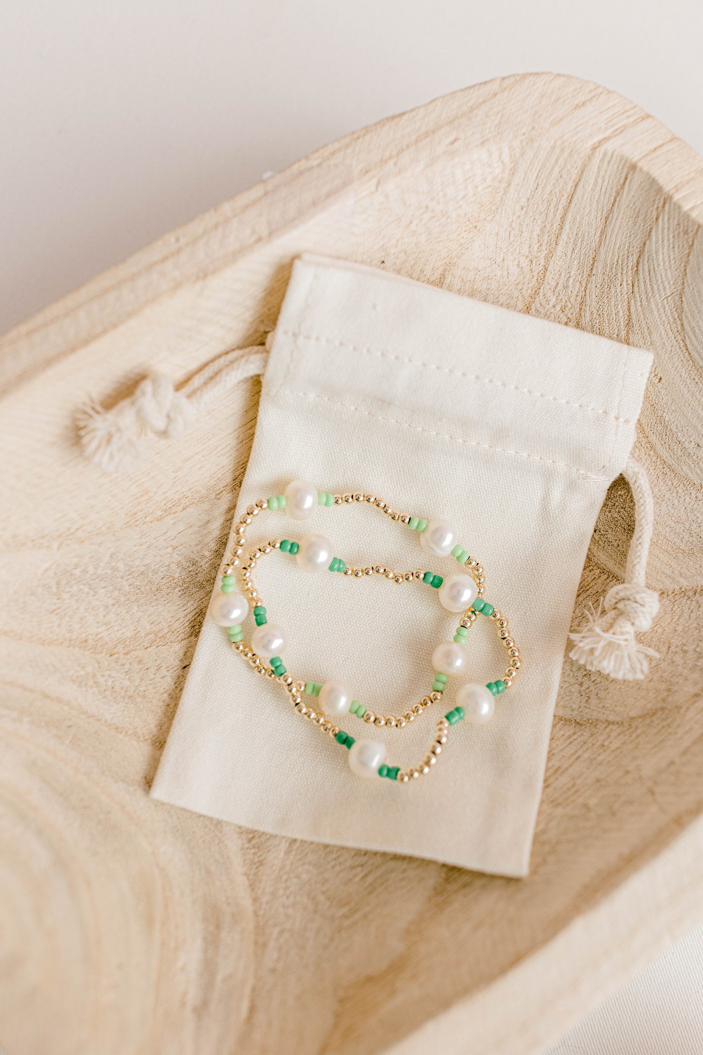 Our signature Pearly Pop bracelet design has our heart! They're fun, simple, and perfect for any occasion! These bracelets include 3mm 14k gold filled beads, freshwater pearls, and colored seed beads of your choosing.