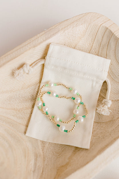 Our signature Pearly Pop bracelet design has our heart! They're fun, simple, and perfect for any occasion! These bracelets include 3mm 14k gold filled beads, freshwater pearls, and colored seed beads of your choosing.