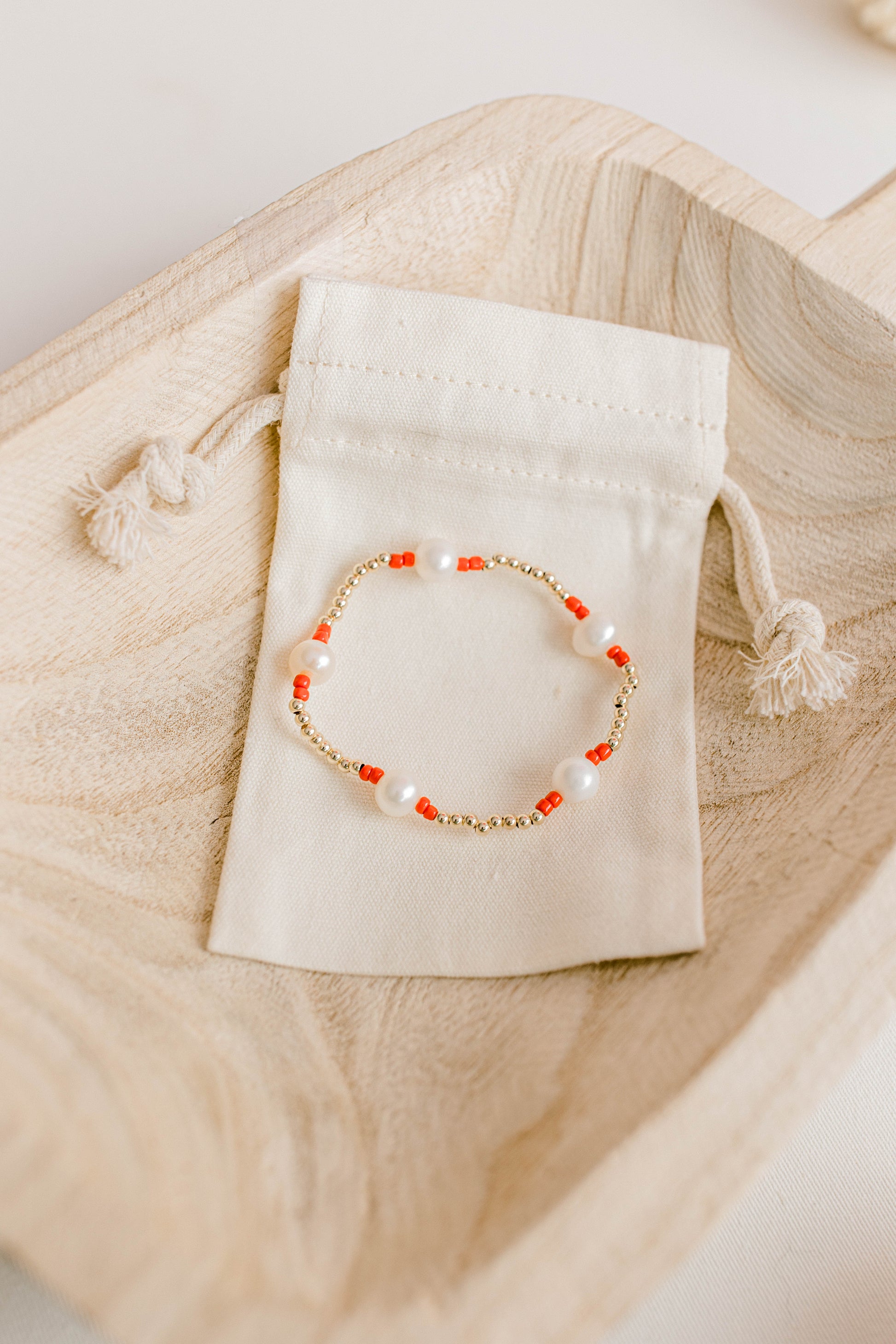 Our signature Pearly Pop bracelet design has our heart! They're fun, simple, and perfect for any occasion! These bracelets include 3mm 14k gold filled beads, freshwater pearls, and colored seed beads of your choosing.