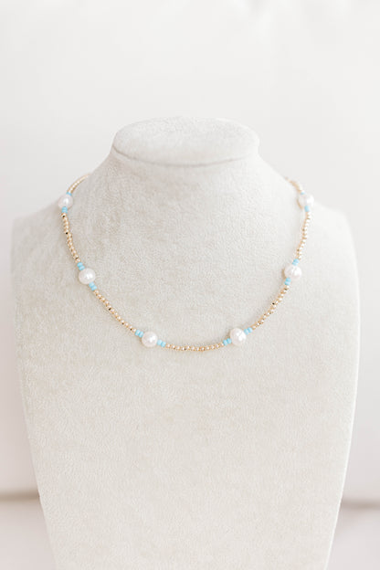 Just like our popular pearly pop bracelets, but in necklace form! The perfect piece for when you need a 'pop" of color!  Cute alone or layered with other pearly pops! 15 in with 2 in extender, fresh water pearls, seed beads, gold filled beads, gold filled clasp, and jump rings.