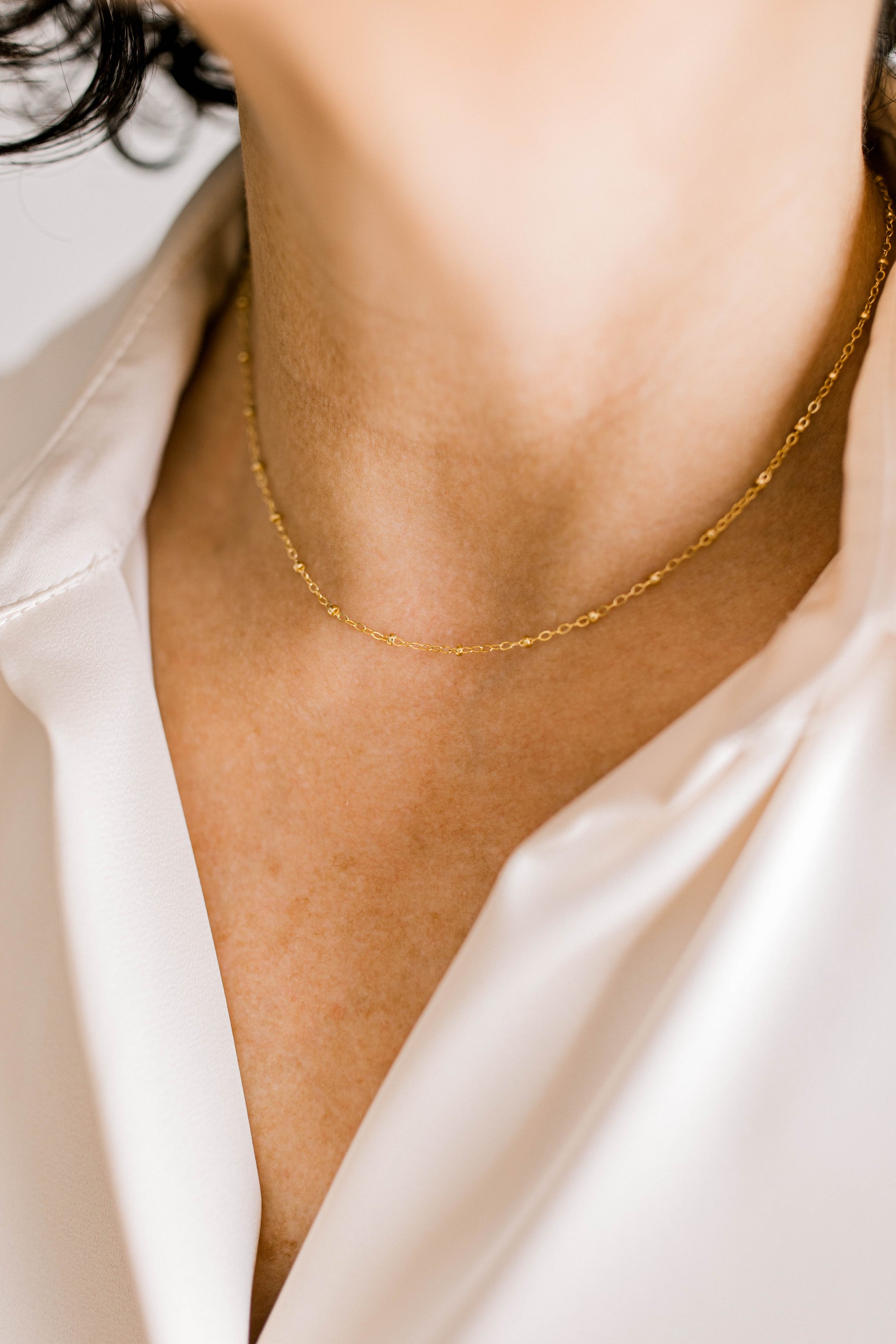 Simple and sophisticated! This is a perfect 14K dainty gold filled chain with a 14K gold filled lobster clasp. 15 inch chain with optional 1, 2, or 3 inch extender.