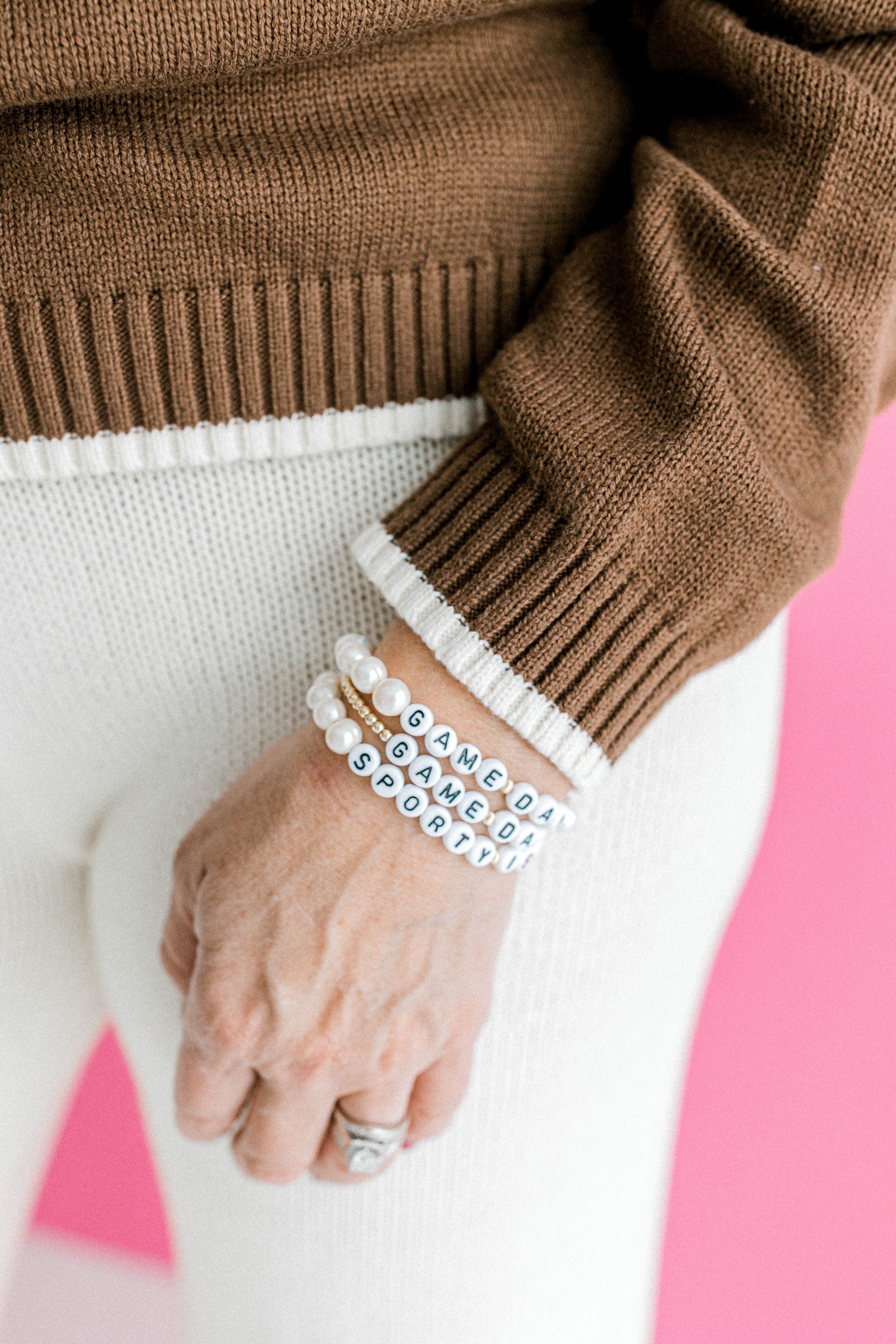 Pearly Pie Game Day Collection bracelets. 14k gold beaded game day bracelet with white letter beads and pearl beaded bracelets with white letter beads. Handmade using the highest quality materials.